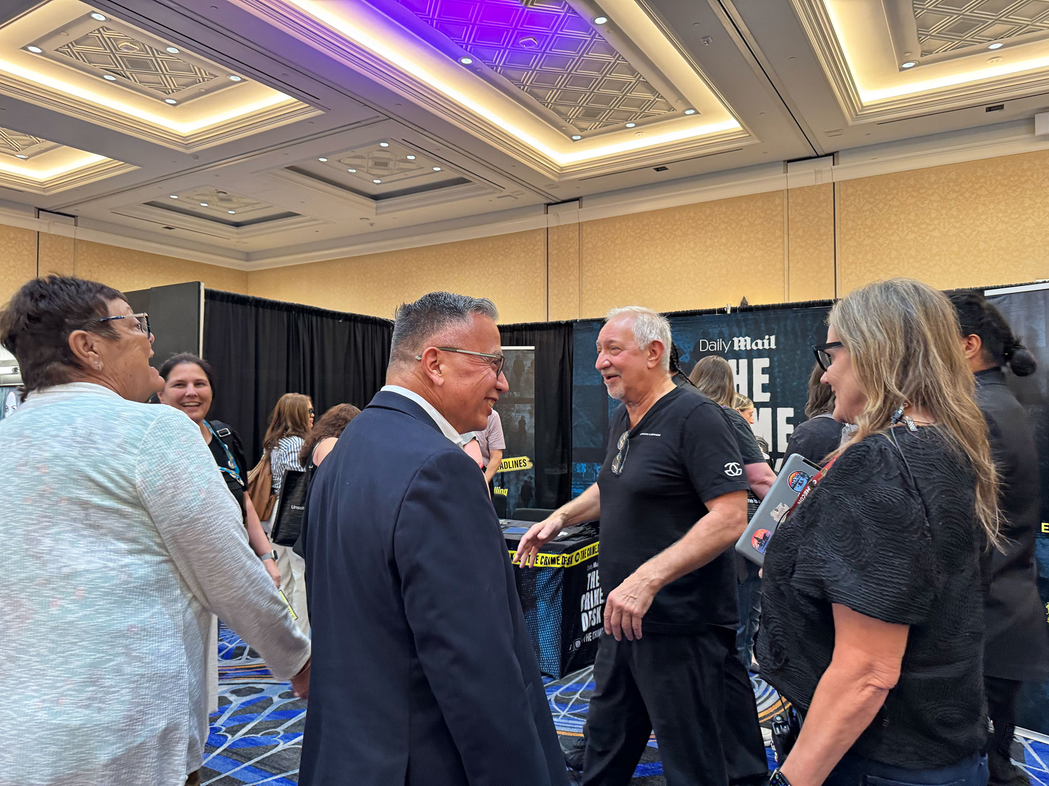 Moses Castillo joins a recorded panel discussion at the MK True Crime booth during CRIMECON
